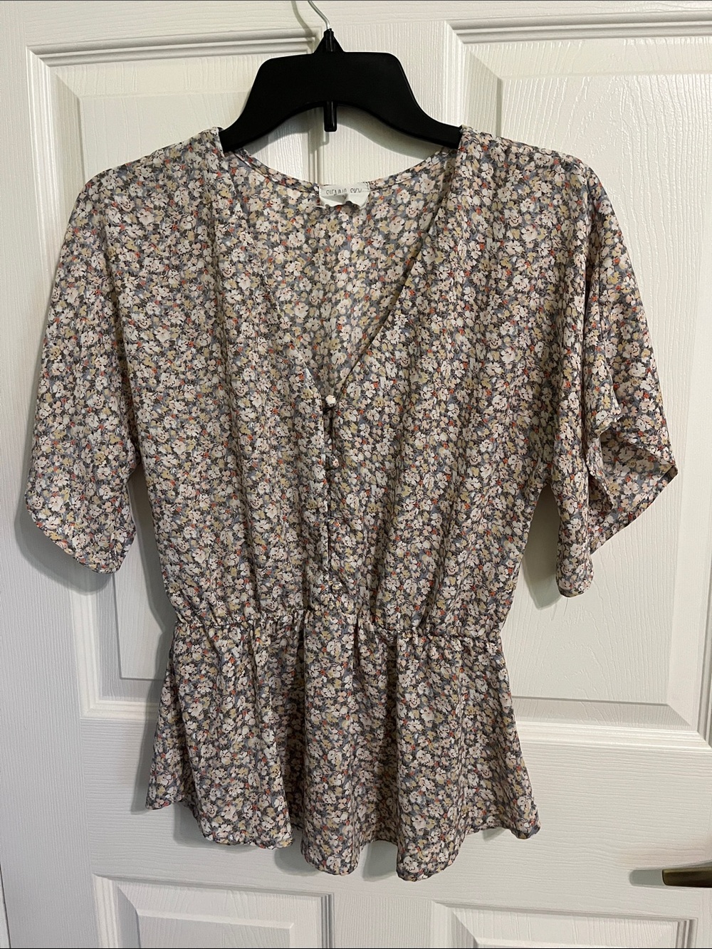 Sienna Sky Beige Floral V-Neck Peplum Tunic